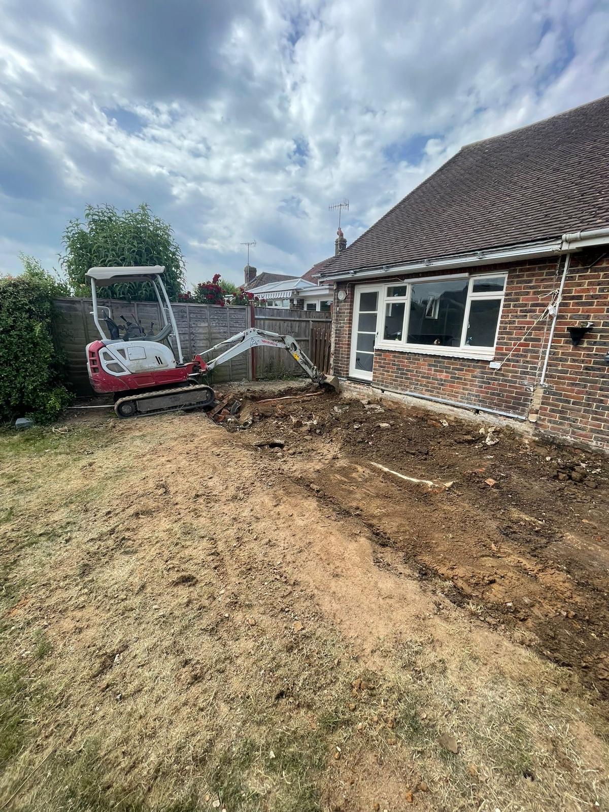 Rear garden dig-out ready for a new extension