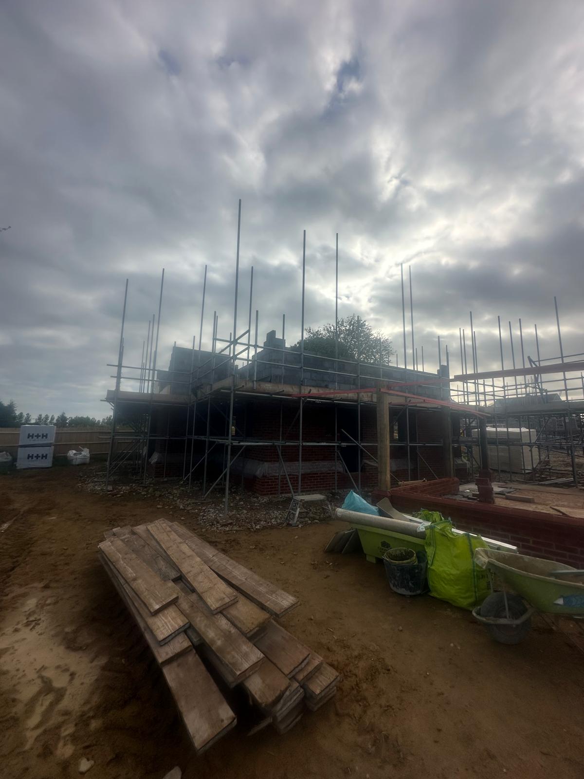 Two-storey new build at first-floor blockwork stage