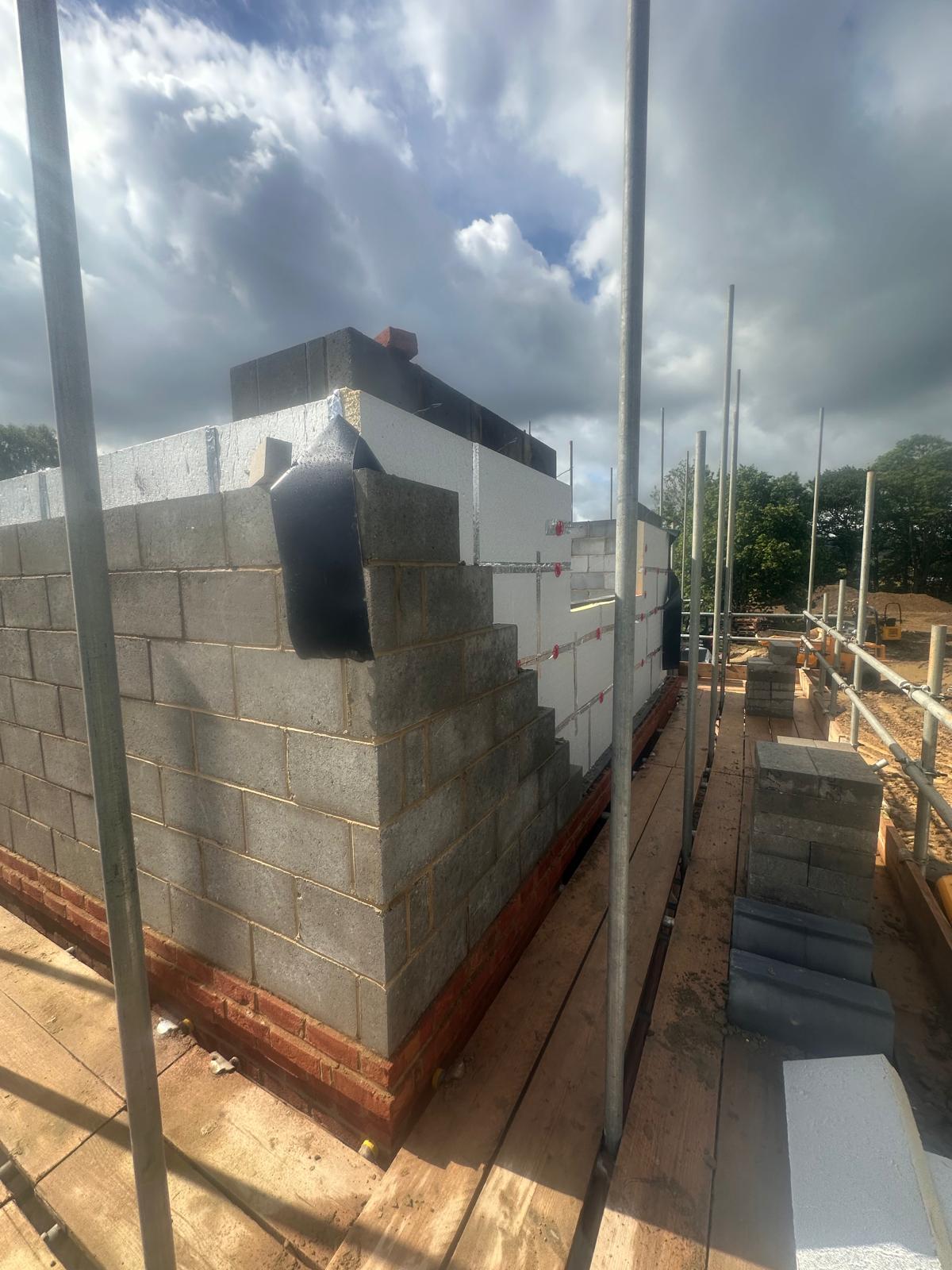 Completed chimney and gable blockwork at wall-plate