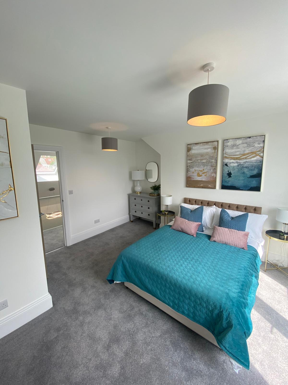 Finished loft master bedroom with en-suite access