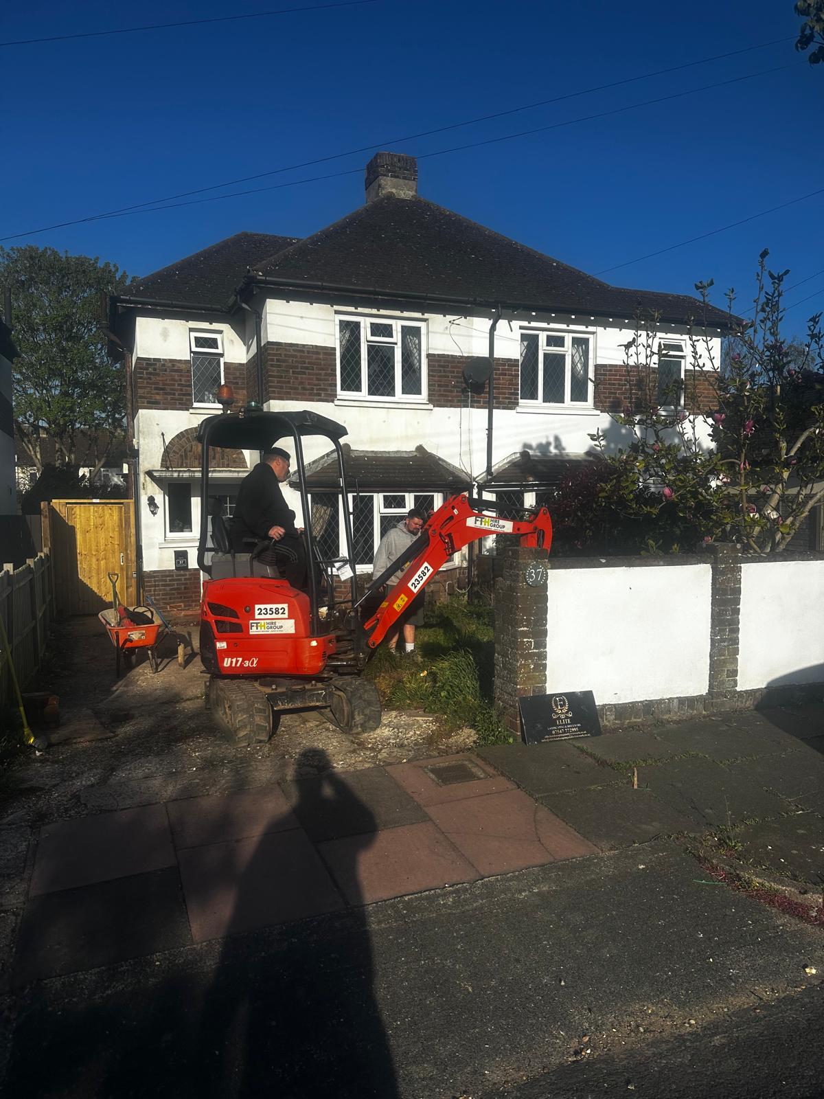 Driveway dig-out with mini-excavator