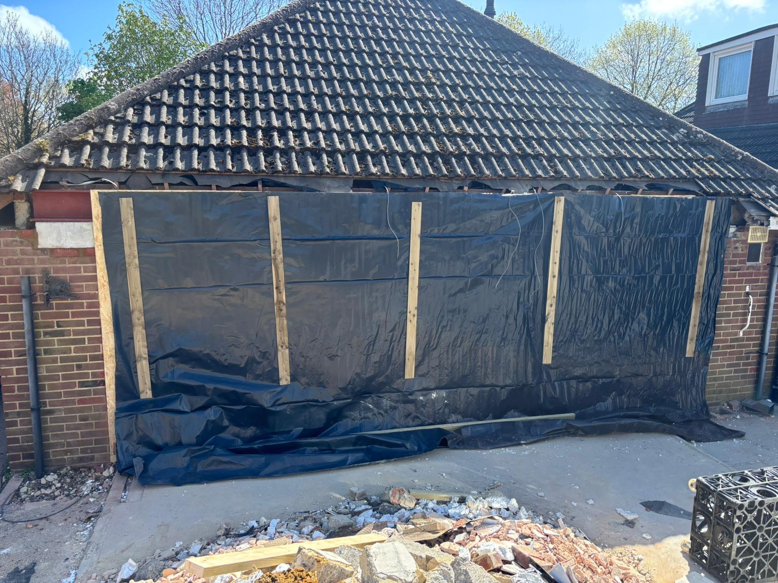 Roof strip-out and weatherproofing prep