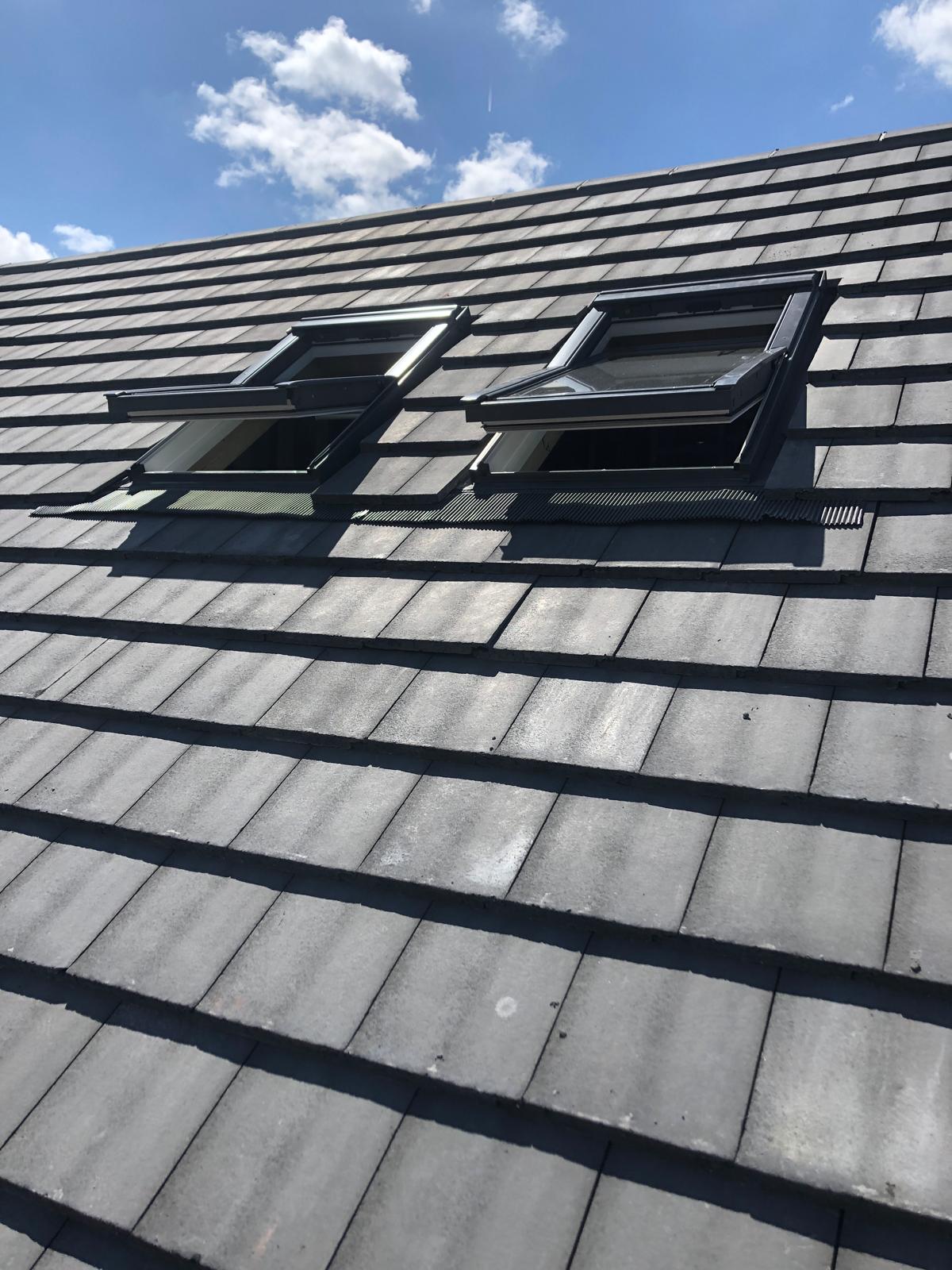 Rooflights installed into a re-tiled pitched roof